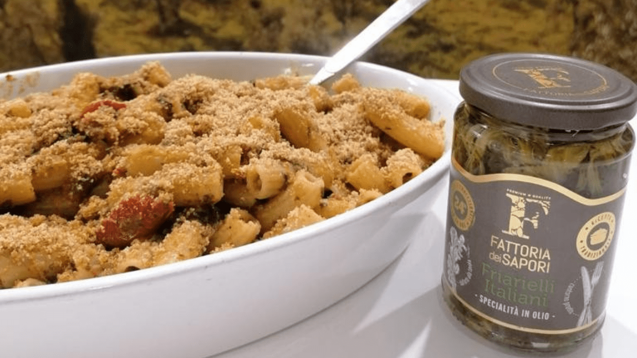 RIGATONI CON FRIARIELLI, POMODORI E SALSICCIA